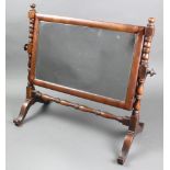 A 19th Century rectangular plate dressing table mirror contained in a mahogany bobbin turned frame