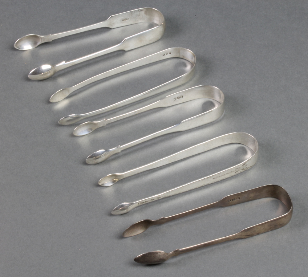 A pair of Georgian silver sugar nips of plain form by P & W Bateman London 1790 and 4 other pairs