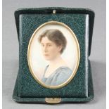 An early 20th Century watercolour miniature portrait of a lady 2 1/2" x 2"