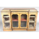 A Victorian inlaid rosewood inverted breakfront display cabinet/credenza with crossbanded top and