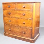 A Victorian mahogany D shaped chest of 2 short and 3 long drawers with tore handles, raised on a