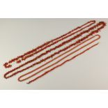 A coral bead necklace 28", the beads 5mm in diam. and 3 other coral necklaces