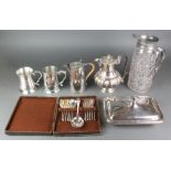 A silver plated mounted water jug and minor plated items