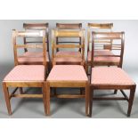 A harlequin set of 6 19th Century mahogany bar back chairs with shaped mid rails comprising 4 and