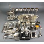 A silver plated pierced condiment stand and minor plated items