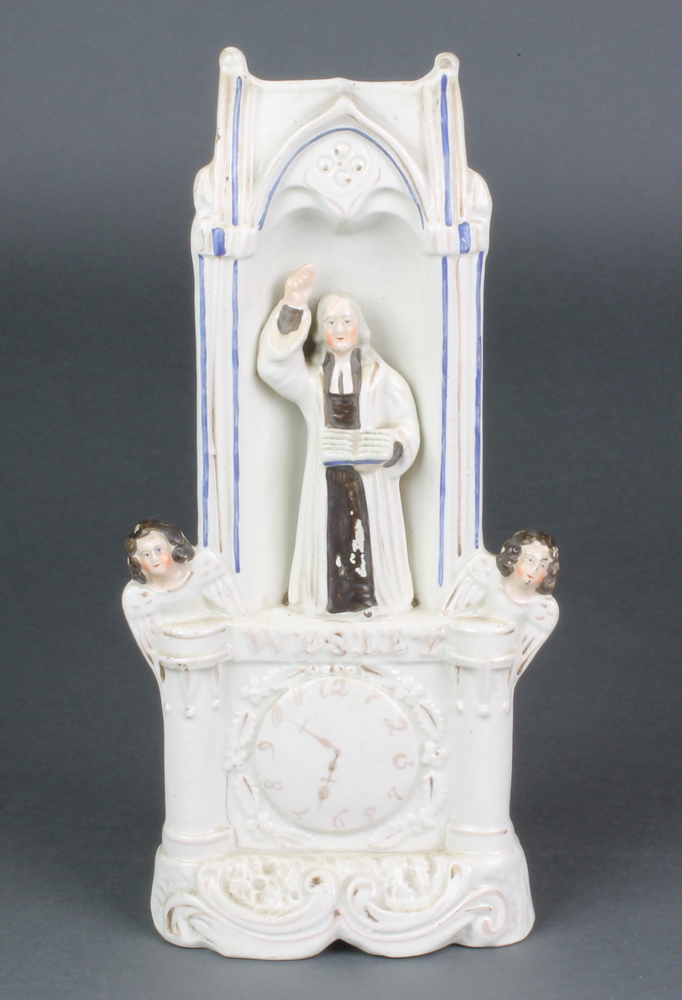 A Victorian Staffordshire figure of Wesley in the Pulpit 11" There is cracking to the base and minor