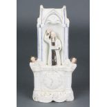 A Victorian Staffordshire figure of Wesley in the Pulpit 11" There is cracking to the base and minor