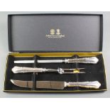 A cased set of silver plated carvers by Arthur Price