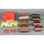 A Hornby O gauge level crossing (f) and a collection of various Hornby rolling stock