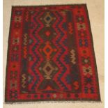 A contemporary red and blue ground Kilim 78" x 58"