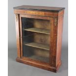 A Victorian walnut pier cabinet enclosed by panelled doors, inlaid satinwood stringing throughout