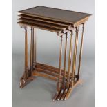 An Edwardian quartetto of rectangular interfitting tables raised on turned supports 28 1/2"h x 23"