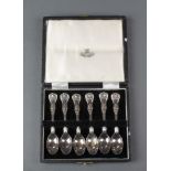 A set of cased Kings pattern silver coffee spoons, Sheffield 1935, 72 grams