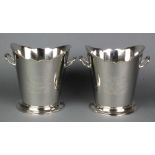 A pair of plated 2 handled wine coolers with armorial decoration 8"