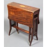 An Edwardian inlaid mahogany Sutherland table of serpentine outline the top inlaid cross banding and