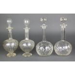 A pair of Edwardian mallet shaped decanters with faceted decoration 12", a ditto pair with hobnail