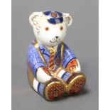 A Royal Crown Derby Japan pattern paperweight - Schoolboy Teddy with gold stopper 3 1/5"