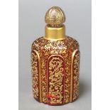 A 19th Century ruby glass gilt decorated Bohemian hexagonal scent bottle decorated with floral