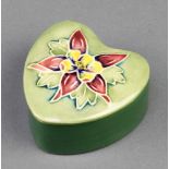 A Moorcroft green ground clematis heart shape box 2 1/2"