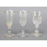 Two 19th Century wine glasses with panel cut bodies and 1 other