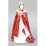 A Royal Worcester figure to celebrate the Queen's 80th birthday of Her Majesty wearing the robes