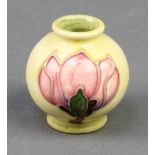 A Moorcroft yellow ground magnolia baluster vase 1 3/4"