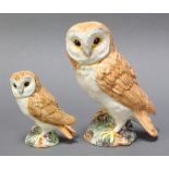 A Beswick figure of an owl, impressed Beswick 1046 7" together with 1 other impressed 2026 5"