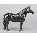 A Beswick figure of a black horse 9"