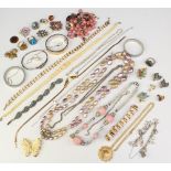 A silver charm bracelet and minor costume jewellery