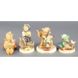 4 Hummel figures - boy with flute and bird 63 3", boy with concertina and bird 3", girl with chicken