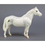 A Beswick figure of a white dappled horse - Connemara 9"