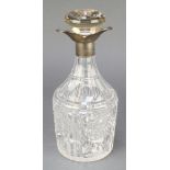 A cut glass decanter with silver collar Sheffield 1960 10" The stopper is later ( replacement ),
