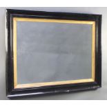 A Victorian rectangular plate mirror contained in a gilt and ebonised frame 41 1/2"h x 53"w