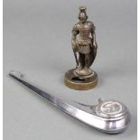 A car mascot in the form of a standing warrior with shield 4 1/2" (hole to head) together with a