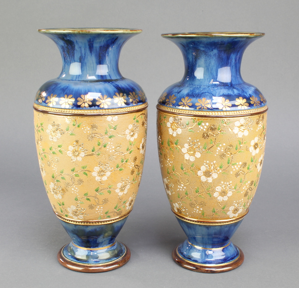 A pair of Royal Doulton oviform vases, the blue ground with wide band of flowers 7205, 11"