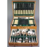 An Art Deco style canteen containing a set of silver plated cutlery for 6