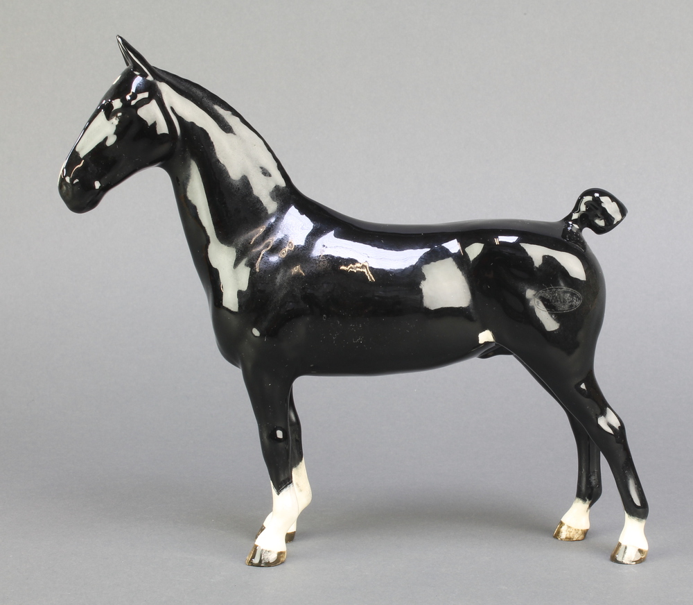 A Beswick figure of a horse C H Black Magic 8 1/2"