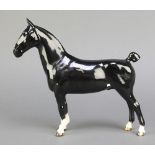 A Beswick figure of a horse C H Black Magic 8 1/2"