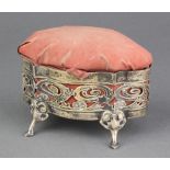 An Edwardian serpentine silver trinket box with pin cushion lid and pierced decoration on pad feet