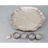 A silver plated salver with bead rim 8", 3 silver napkin rings, a plated ditto and a plated locket