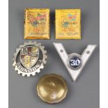 A pierced London radiator badge, a Motorist radiator badge, 2 enamelled Speedwell lubrication