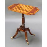 A 19th Century style shaped and inlaid mahogany chess table, raised on pillar and tripod base with