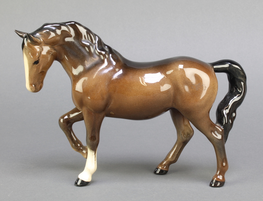 A Beswick figure of a brown horse 9"