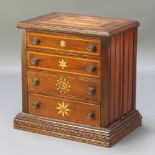 A Victorian inlaid mahogany table top chest, the top inset various specimen woods, fitted long