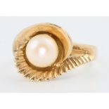 A 14ct yellow gold pearl set ring, size P