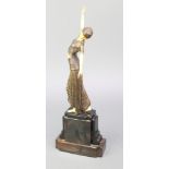 An Art Deco style figure of a standing lady raised on a marble effect base 15"The arms are the wrong