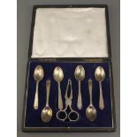 A cased set of 6 silver teaspoons and nips, London 1944/45, 112 grams