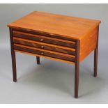 Illum Wikkelso, a mid 20th Century rectangular teak table raised on square