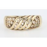 A 14ct gold diamond swirl ring, size P