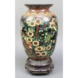 A 19th Century Japanese black ground cloisonne enamelled vase decorated birds amidst floral branches